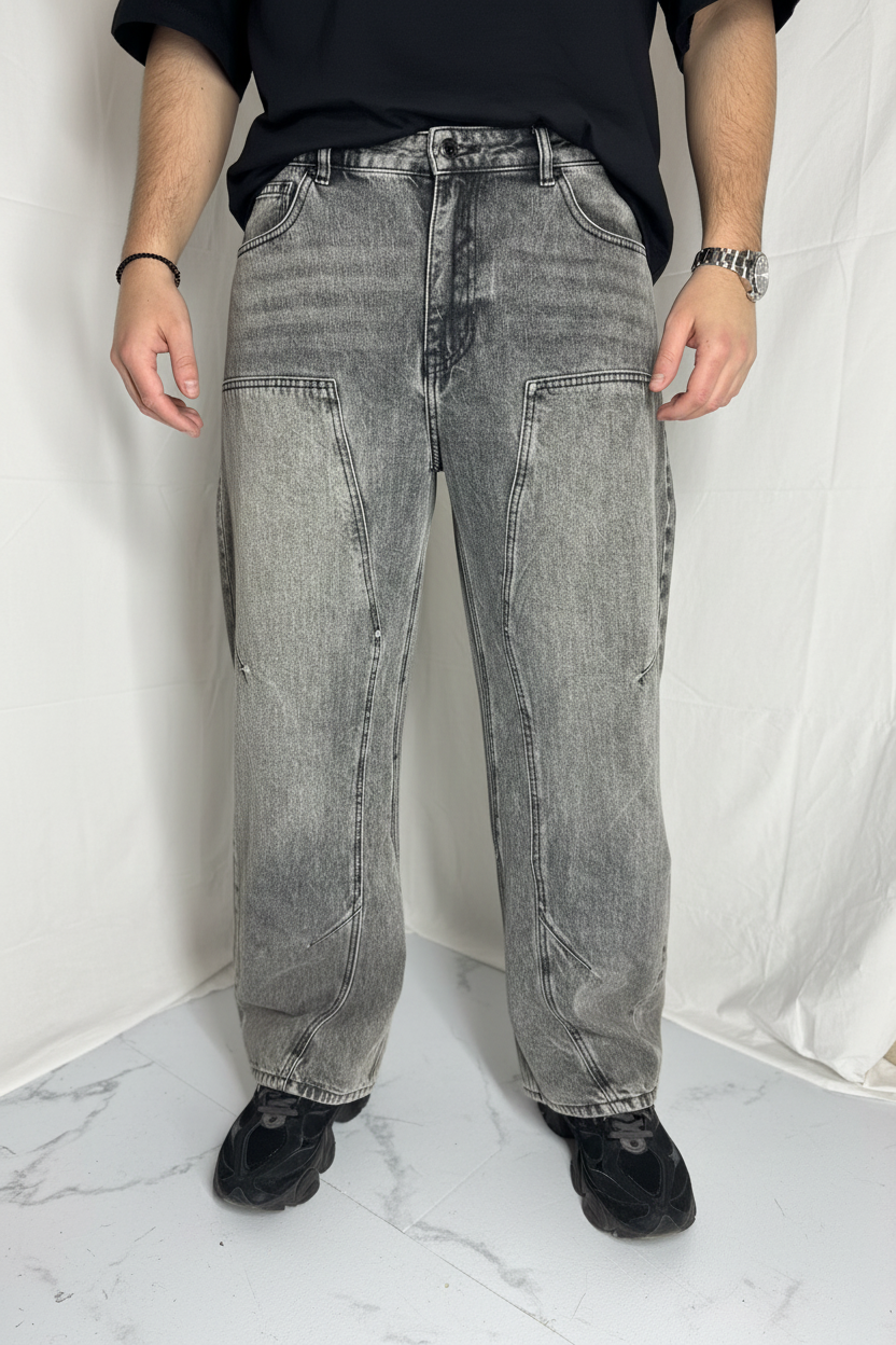 Jeans grigi indossati